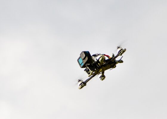 Freestyle drone is flying in the air