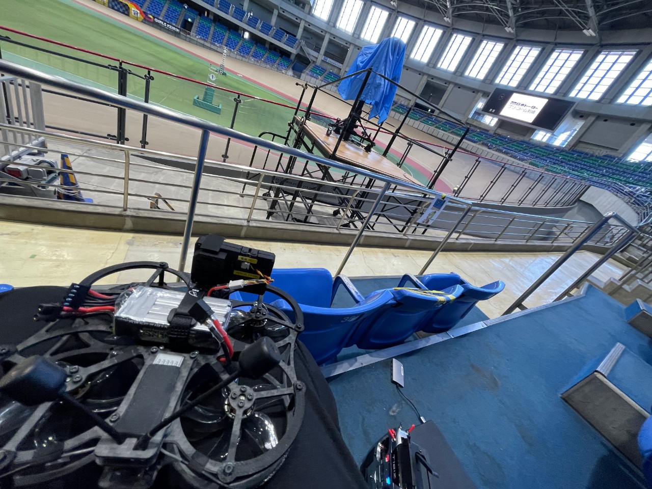 Inside of Maebashi Keirin (Bicycle racetrack). FPV drone is placed on the stage