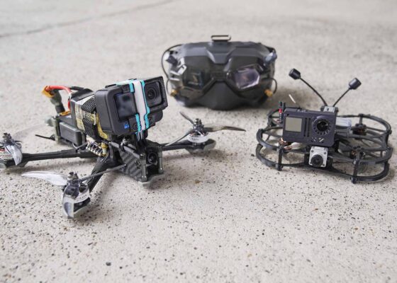 FPV drone, micro drone, and goggles are in the picture.