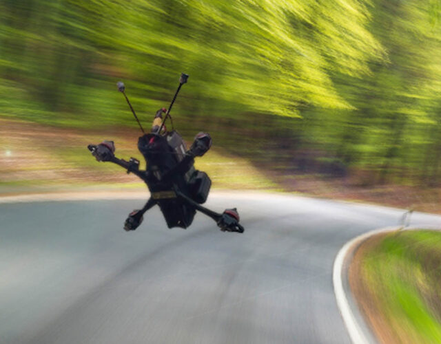 Freestyle drone is flying in the air